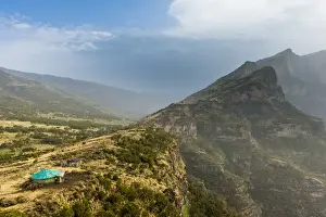 Meteorological Prints: Community house on the edge of a cliff