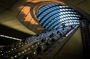Docklands Prints: Commuters at Canary Wharf underground station taken as the sun was setting