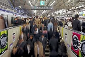 Images Dated 13th December 2010: Commuters moving through Shibuya Station during rush hour, Shibuya District