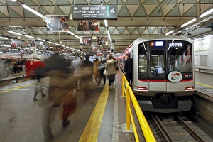 Images Dated 13th December 2010: Commuters moving through Shibuya Station during rush hour, Shibuya District