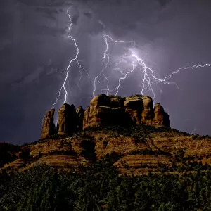 Cathedral Rock Gallery: Composite photo of lightning striking southwest of Cathedral Rock in Sedona, Arizona