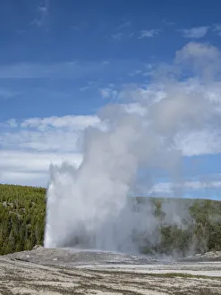 Geyser Prints: The cone geyser called Old Faithful erupting, Yellowstone National Park