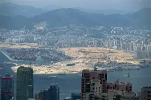 Kowloon Prints: Construction site on reclaimed land in Kowloon in Victoria Harbour, Hong Kong