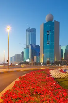 Typically Middle Eastern Prints: Contemporary architecture on Rashid Bin Saeed Al Maktoum Street at dusk