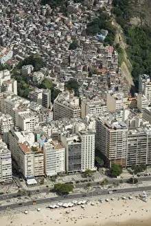 Favela Prints: Copacabana Beach, neighbourhood and the Morro da Humaita favela behind, Rio de Janeiro