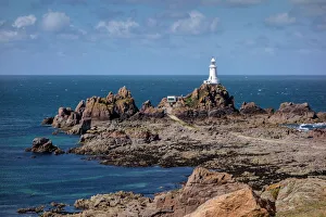 Lighthouses Prints: Corbiere Lighthouse and rocky coastline, Jersey, Channel Islands, United Kingdom, Europe