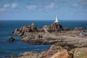 Lighthouse Gallery: Corbiere Lighthouse and rocky coastline, Jersey, Channel Islands, United Kingdom, Europe