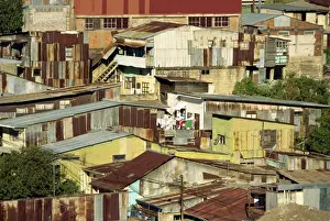 Slum Prints: Corrugated iron buildings in a poor barrio north of the centre of San Jose