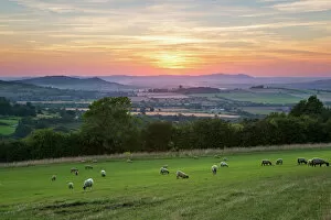 Gloucestershire Collection: Cotswold landscape and distant Malvern Hills at sunset, Farmcote, Cotswolds, Gloucestershire
