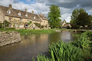 Cottages Prints: Cotswold stone cottages on the River Eye
