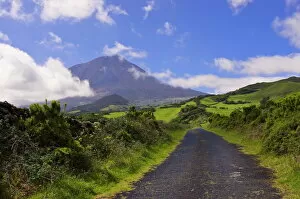 Country road with Mount Pico volcano in background, Pico, Azores, Portugal, Europe