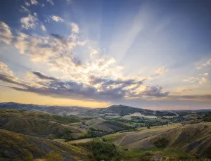 Countryside landscape at sunset with a sky full of clouds, Emilia Romagna, Italy, Europe Countryside landscape at sunset with a sky full of clouds, Emilia Romagna, Italy, Europe