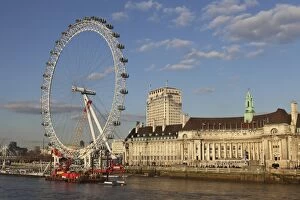 Millennium Wheel Collection: County Hall, home of the London Aquarium, and the London Eye on the South Bank of the River