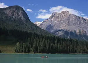 Rockies Prints: Couple in a canoe on Emerald Lake in the Rocky Mountains in British Columbia