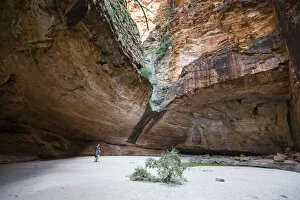 Couple in the Cathedral Gorge in the Purnululu National Park, UNESCO World Heritage Site, Bungle Bungle mountain range