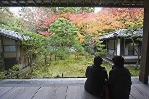 A couple contemplating the autumn colours, Koto in Zen temple dating from 1601