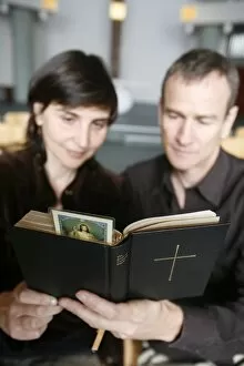 Images Dated 14th March 2007: Couple reading the Bible, Paris, France, Europe