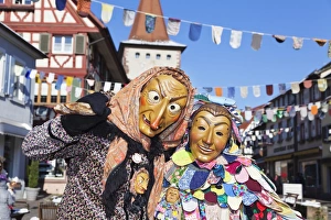 Carnival Prints: Couple in traditional costumes of Witch and Spattlehansel