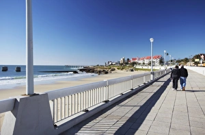 View From Behind Prints: Couple walking along Humewood beachfront, Port Elizabeth, Eastern Cape