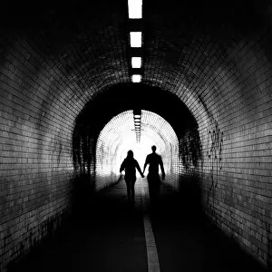 York Collection: Couple walking into the light, York tunnel, York, England, United Kingdom, Europe