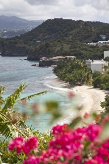 Images Dated 26th October 2009: Couple walking along sandy stretch of Magazine Beach in Grenada, Windward Islands
