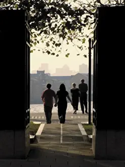 Docklands Prints: Two couples on Canary riverside walk alongside River Thames, Canary Wharf