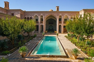 Typically Iranian Prints: Courtyard of late 18th century Qajar Mansion, now Serai Ameriha Hotel, Kashan, Iran