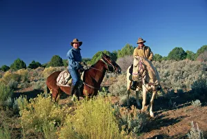 Portraits Prints: Two cowboys on horseback near Kanab