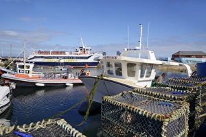 Fish Traps Prints: Crab pots and boats in the harbour