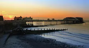 Cromer Prints: Cromer Pier at sunset, summer evening, Norfolk, England, UK