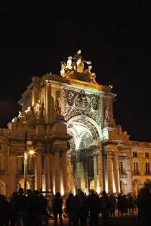 Images Dated 13th August 2011: A crowd on Praca do Comercio for the Oceanos Festival under the illuminated Rua Augusta Arch in