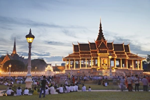 Phnom Penh Prints: Crowds outside Royal Palace at dusk, Phnom Penh, Cambodia, Indochina, Southeast Asia, Asia