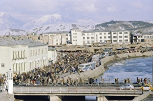 Kabul Prints: Crowds of people and buses in the city, Kabul, Afghanistan