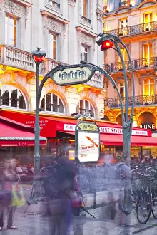Metro Prints: Crowds of people rushing through the entrance to a metro station in Paris, France, Europe