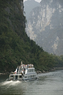 Guangxi Prints: Cruise boat between Guilin and Yangshuo, Li River, Guangxi Province, China, Asia