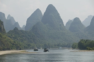 Guangxi Prints: Cruise boats between Guilin and Yangshuo, Li River, Guangxi Province, China, Asia