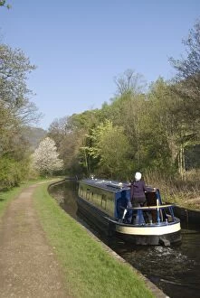 A cruising narrow boat on the Llangollen Canal, Wales, United Kingdom, Europe