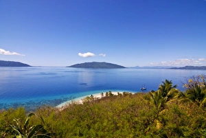 Images Dated 12th August 2007: Crystal clear water and white sand beach, in the background Nosy Komab
