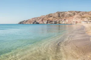 Love Prints: Crystal-clear waters gently kiss the sandy shores of Paleochori Beach