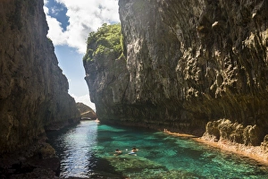 Swimming Prints: Crystal waters in the Matapa Chasm, Niue, South Pacific, Pacific