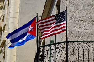 Patriotism Prints: Cuban and American flags waving side by side, Old Havana, Cuba, West Indies