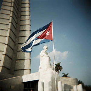Nationalism Prints: Cuban flag and Jose Marti memorial, Plaza de la Revolucion, Havana, Cuba