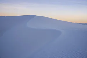 Alamogordo Prints: The curve of a sand dune at sunset in White Sands National Park, New Mexico