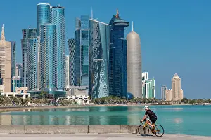 Fitness Prints: A Cyclist against the West Bay Skyline, Doha, Qatar, Middle East