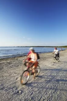 Images Dated 22nd August 2009: Cyclists on Pirita Beach, Tallinn, Estonia, Baltic States, Europe