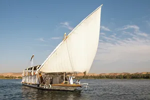 Wooden Boat Prints: Dahabeah under sail, passenger river boat of the Lazuli fleet