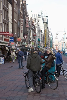 Bicycles Prints: Damrak, a busy thoroughfare in the centre of the city, Amsterdam, Netherlands, Europe