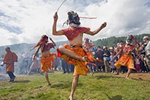 Images Dated 4th October 2009: Dancers in costume at Thangbi Mani Tsechu (festival), Jakar, Bumthang, Chokor Valley