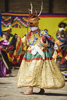 Images Dated 4th October 2009: Dancers in costume at Thangbi Mani Tsechu (festival), Jakar, Bumthang, Chokor Valley