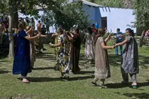 Images Dated 19th August 2009: Dancing guests at wedding at Pamiris, Bartang Valley, Tajikistan, Central Asia, Asia